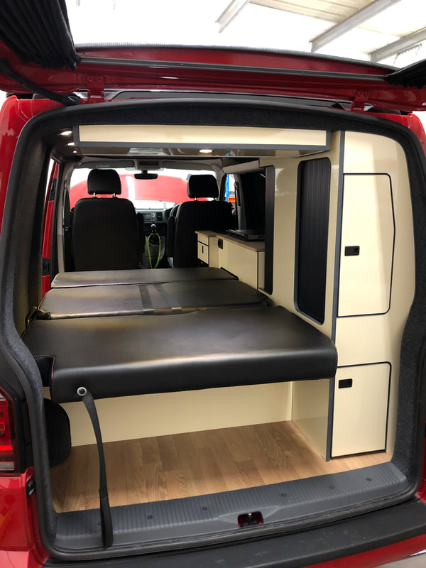 VW Campervan conversion, RIB bed, Evo motion furniture, wooden floor